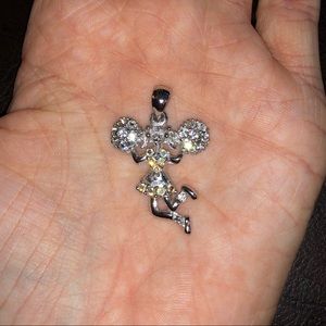 Cheerleader charm with swinging legs. No chain.